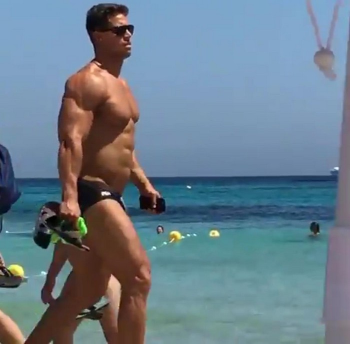 Fan Took Video of Kris Evans Walking Down A Beach in Ibiza